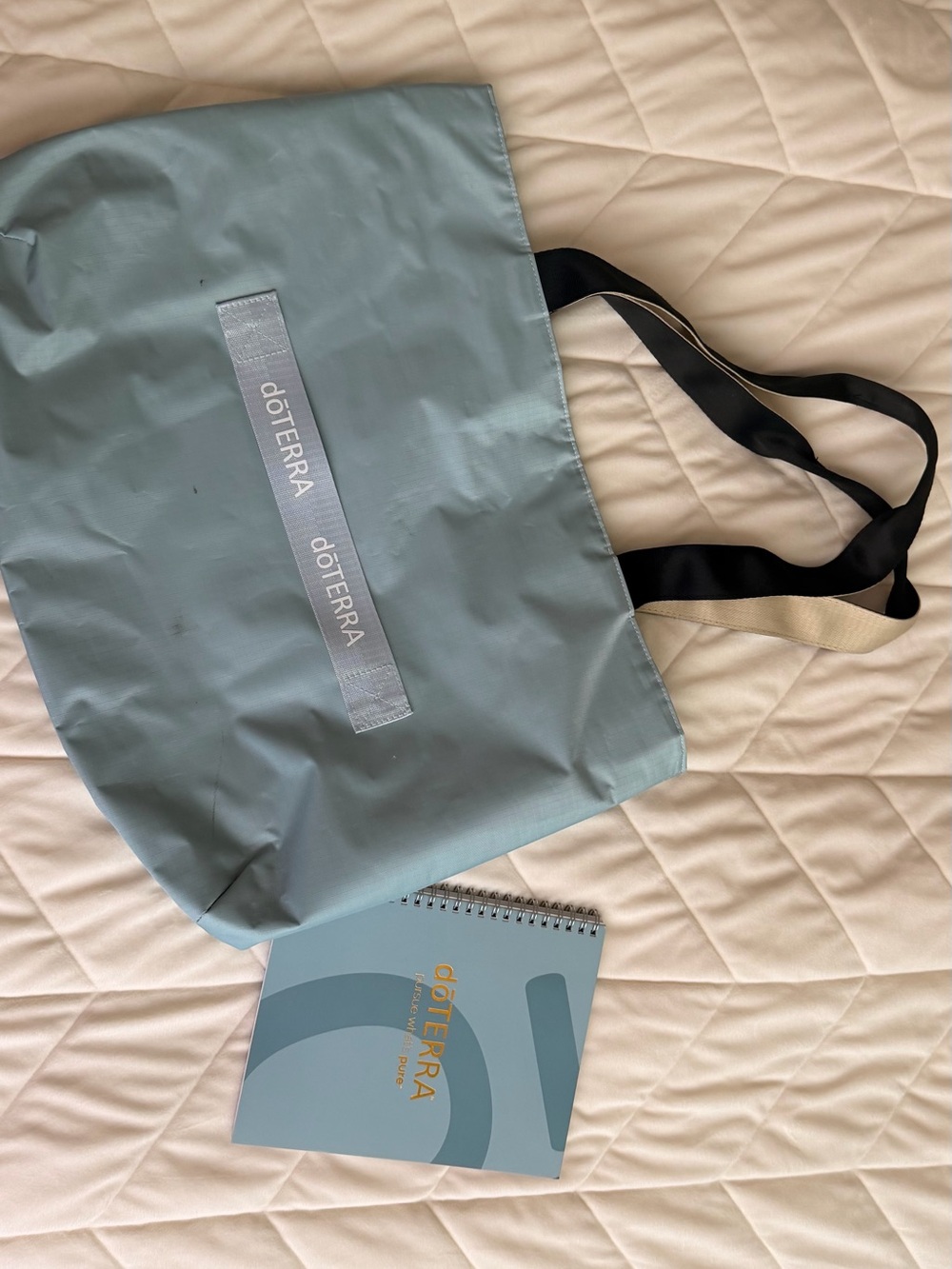 Doterra light blue tote with pale blue logo strap
